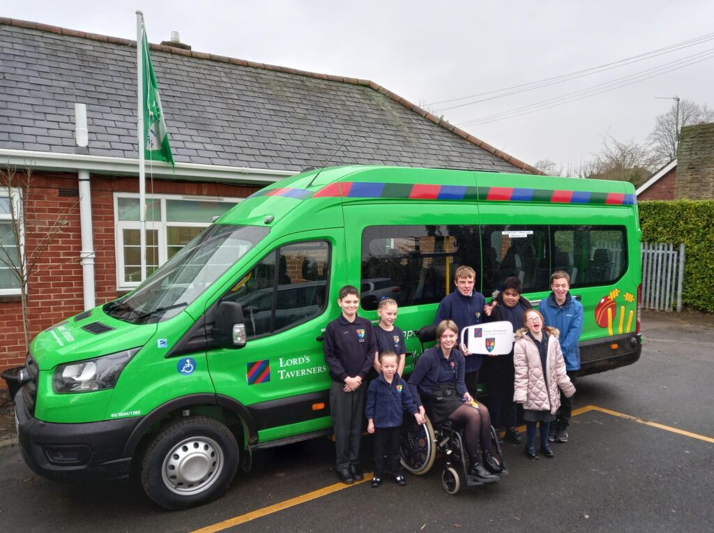 pupils with their new minibus